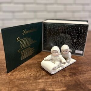 Department 56 Snowbabies figurine titled "Hold on
Tight"
